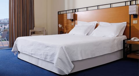 Economy Double or Twin Room | In-room safe, iron/ironing board, cribs/infant beds, free WiFi