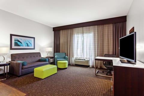 Suite, One King Bed | Desk, laptop workspace, blackout drapes, iron/ironing board