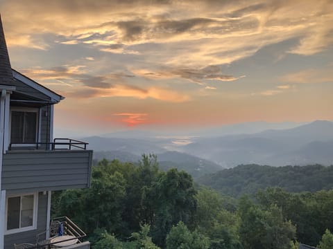 Watch the sunrise over the Smokies. See the Gatlinburg lights at night.