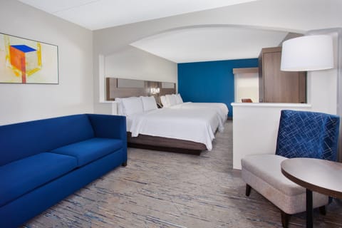 Suite, 2 Queen Beds | In-room safe, desk, iron/ironing board, free cribs/infant beds