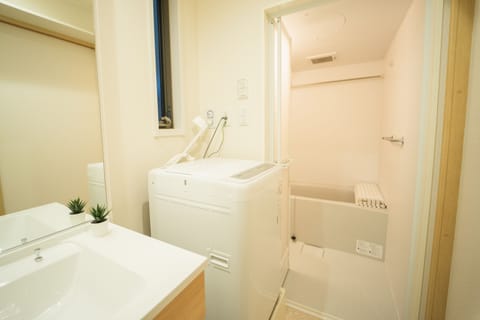 Separate tub and shower, free toiletries, hair dryer, electronic bidet