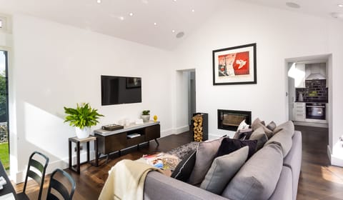 Stylish and Relaxing Open Plan Living Area with built Log Burner.