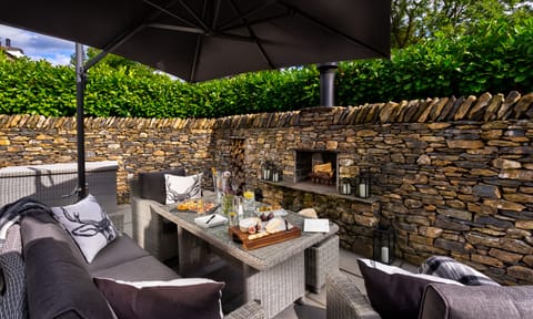 Private outside area with built in Log Burner with Orchard & Garden Views.