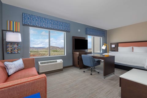 Suite, 1 King Bed, Accessible, Refrigerator & Microwave (Hearing) | Desk, laptop workspace, blackout drapes, iron/ironing board