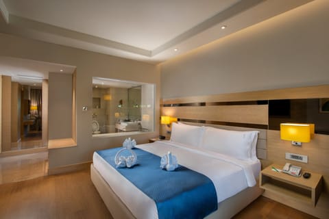 Suite, 1 King Bed | 1 bedroom, premium bedding, minibar, in-room safe