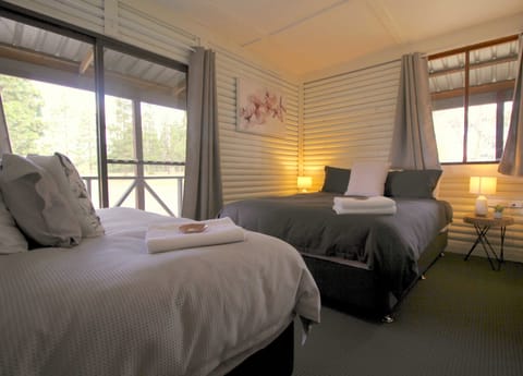 Six Bedrooms Lodge | Minibar, in-room safe, individually decorated, individually furnished