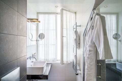 Deluxe Signature | Bathroom | Eco-friendly toiletries, hair dryer, towels, soap