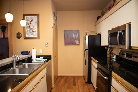 Condo, 1 Bedroom | Private kitchen | Fridge, microwave, oven, coffee/tea maker