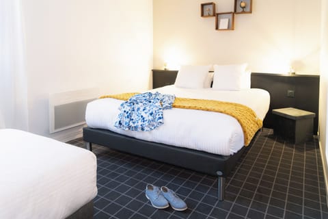 Family Triple Room, Private Bathroom | Premium bedding, in-room safe, desk, blackout drapes