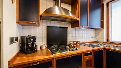 Apartment, 2 Bedrooms | Private kitchenette | Full-size fridge, microwave, oven, stovetop