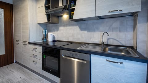 Apartment, 2 Bedrooms | Private kitchen | Full-size fridge, microwave, oven, stovetop