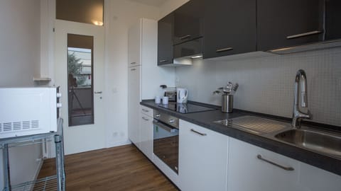 Apartment, 1 Bedroom | Private kitchen | Full-size fridge, microwave, oven, stovetop