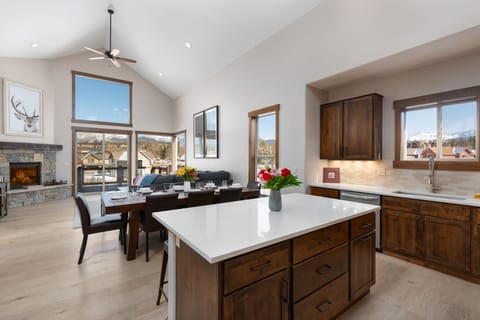 Open floor plan with vaulted ceilings and lots of kitchen counter space.