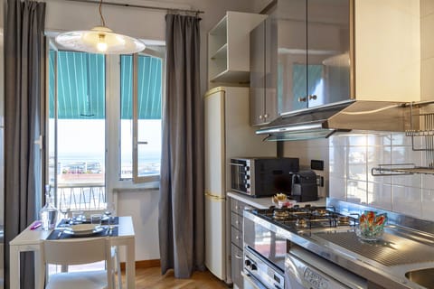 Apartment, 2 Bedrooms, Balcony, Sea View | Private kitchen | Full-size fridge, microwave, oven, stovetop