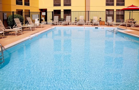 Seasonal outdoor pool, open 9:00 AM to 9:00 PM, lifeguards on site