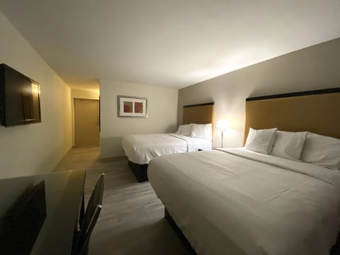 Premium Room, 2 Queen Beds | Individually furnished, desk, laptop workspace, blackout drapes