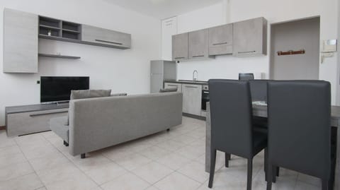Apartment (1 Bedroom) | Living area | 32-inch TV with digital channels