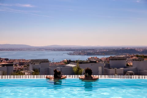 Indoor pool, seasonal outdoor pool, pool umbrellas, sun loungers