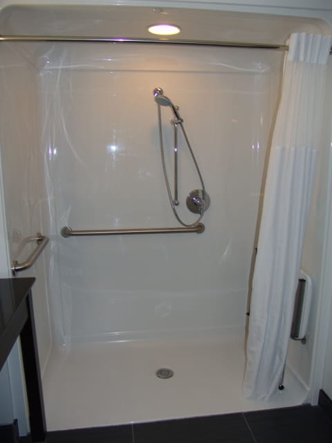 Combined shower/tub, eco-friendly toiletries, hair dryer, towels