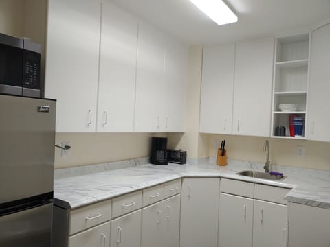 Upstairs kitchen...downstairs kitchen has a small fridge stovetop microwave sink