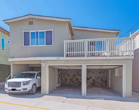 Parking for 2 cars, one in garage and one in carport. Small SUVs will fit. Also see back balcony off of the fourth bedroom!