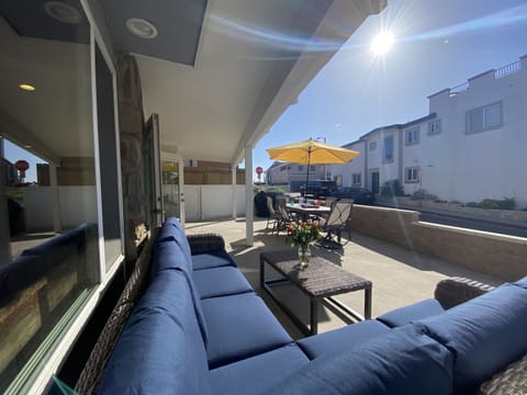 2 houses to the sand. Lots of dining space and Gas BBQ