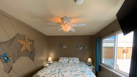 Third bedroom with Large Cal King bed, 43" Smart Fire TV, mirrored closet and dresser drawers!