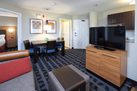Suite, 2 Bedrooms, Non Smoking | Living area | 36-inch LCD TV with cable channels, TV, iPod dock