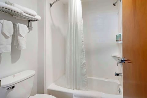 Standard Room, 2 Queen Beds, Non Smoking | Bathroom | Shower, free toiletries, hair dryer, towels