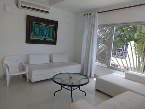 Apartment, 2 Bedrooms, Beach View | Living room | 32-inch flat-screen TV with cable channels, TV