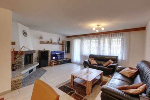 Standard Apartment, 3 Bedrooms | Living area | TV, heated floors