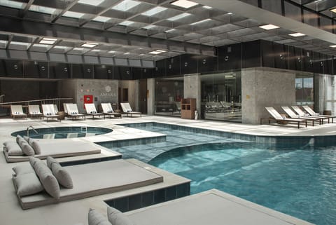 Indoor pool, open 9:00 AM to 10:00 PM, sun loungers