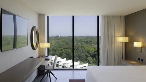Premier Room, 1 King Bed, View (Rainforest View) | Minibar, in-room safe, individually decorated, desk