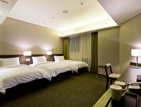 Triple Room | Premium bedding, down comforters, in-room safe, desk