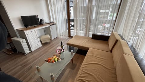 Room, 2 Bedrooms, Smoking, Balcony | Living area | Flat-screen TV