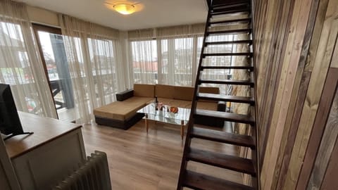 Room, 2 Bedrooms, Smoking, Balcony | Living area | Flat-screen TV