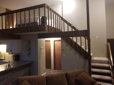 Loft including 1 queen bed and 1 roll away single bed