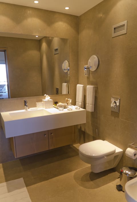Superior Double Room, City View | Bathroom | Combined shower/tub, deep soaking tub, rainfall showerhead