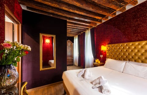 Premium bedding, down comforters, minibar, iron/ironing board