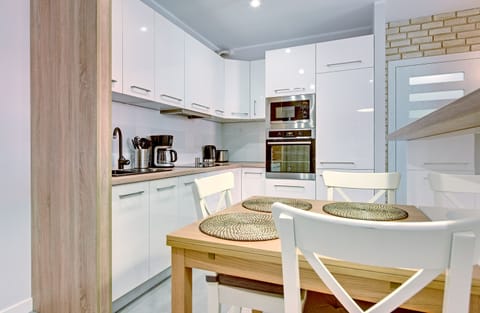 Deluxe Apartment, 1 Bedroom, Balcony (without parking - 99A) | Private kitchenette | Fridge, microwave, stovetop, dishwasher