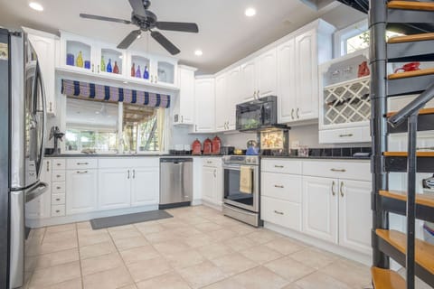 Kitchen equipped with all cooking and dining essentials