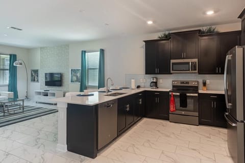 House, Multiple Beds (820DSD - The Retreat at ChampionsGate) | Private kitchen