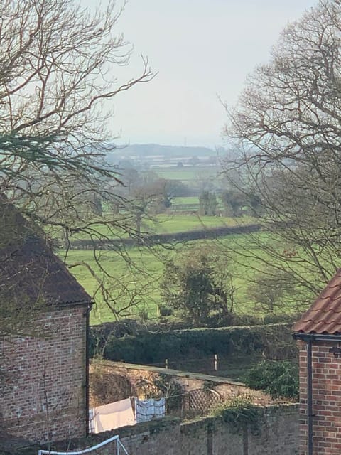 View from the sitting room. The apartment is surrounded by open countryside.