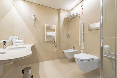 Shower, free toiletries, hair dryer, slippers