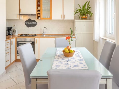 Furniture, Interior Design, Flooring, Kitchen, Wood, Table, Chair, Countertop, Kitchen Appliance, Kitchen & Dining Room Table