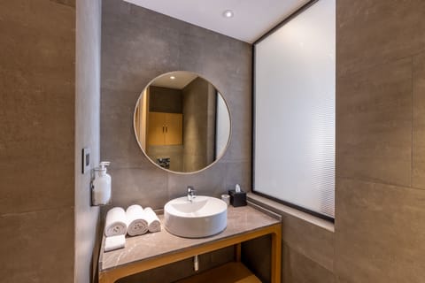 Suite, 2 Bedrooms (Sunrise View) | Bathroom | Rainfall showerhead, free toiletries, hair dryer, bathrobes