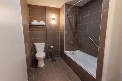 Executive Suite, 1 King Bed, Non Smoking | Bathroom | Combined shower/tub, eco-friendly toiletries, hair dryer, towels