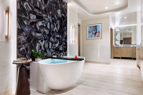 Premium Suite, 2 Bedrooms | Bathroom | Shower, free toiletries, hair dryer, bathrobes