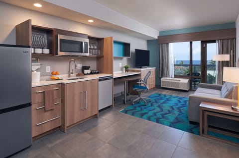 Suite, 1 King Bed, Ocean View | Living area | 55-inch LCD TV with satellite channels, TV