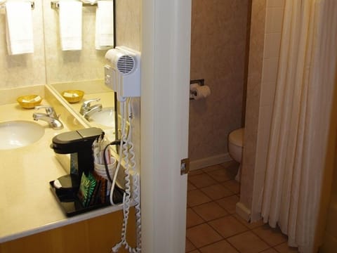 Two Queen Bed Motel Unit | Bathroom | Combined shower/tub, hair dryer, towels